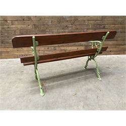 Cast iron and wood slate bench painted in green