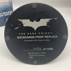 Two Batman replica Batarangs comprising DC Comics QMX Caliber Metalworks 1:1 scale replica with original box, and DC Direct The Dark Knight prop replica no. 33/1500 with original box and certificate of authenticity 