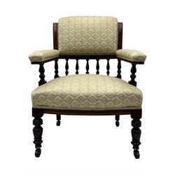 Late Victorian mahogany framed armchair, scroll back with spindle gallery, upholstered seat back and arms