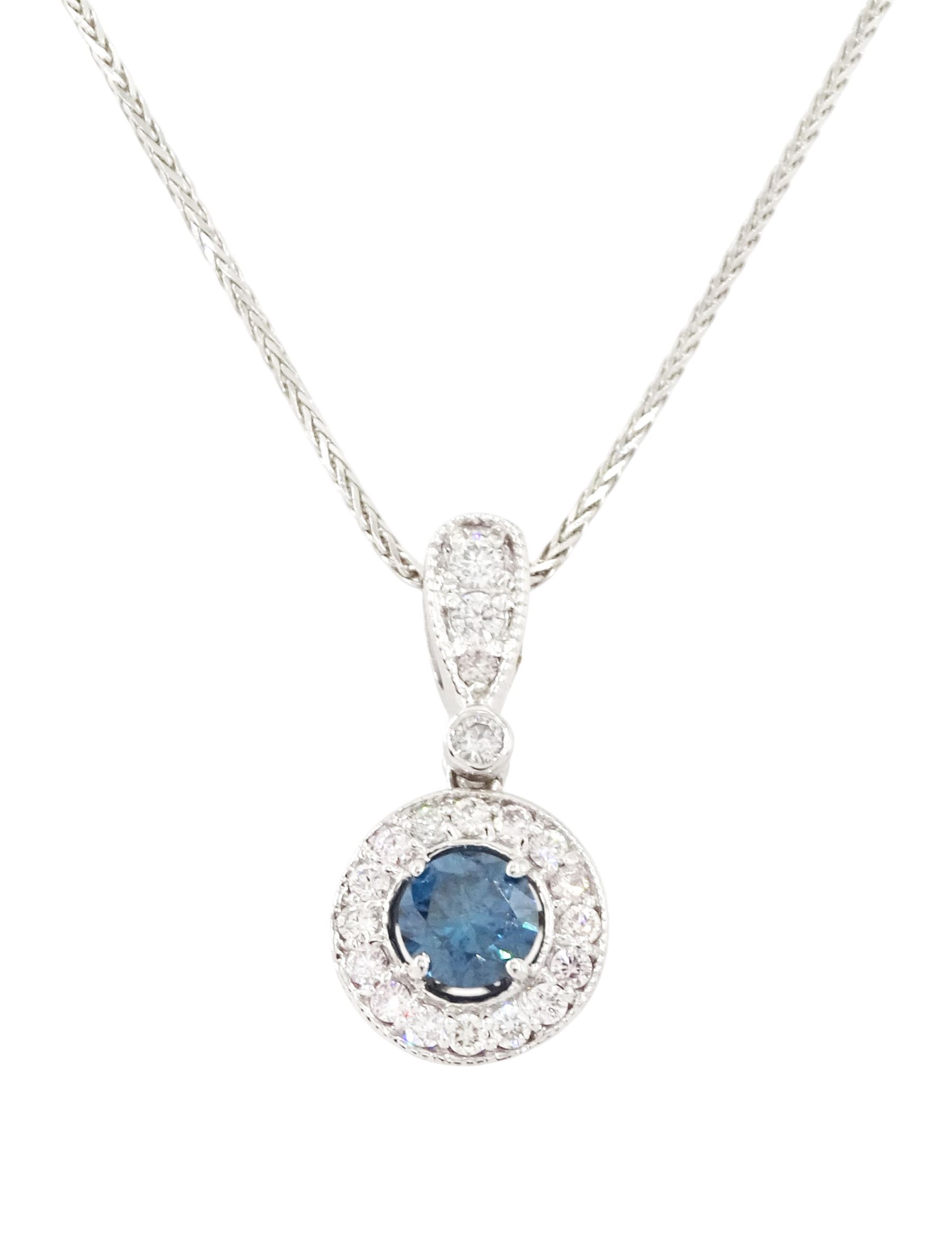 14ct white gold diamond pendant necklace, single round brilliant cut fancy blue diamond of approx 0.45 carat, surrounded by a halo of milgrain set round brilliant cut diamonds, to a diamond set bail, on a wheat link chain necklace, total white diamond weight approx 0.25 carat