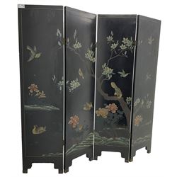 Chinese four-panel folding room screen, black lacquered with a naturalistic scene decorated with trees, birds and flowers