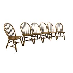 Set six beech dining chairs, hoop and stick back, shaped seat over turned supports joined by turned stretchers 