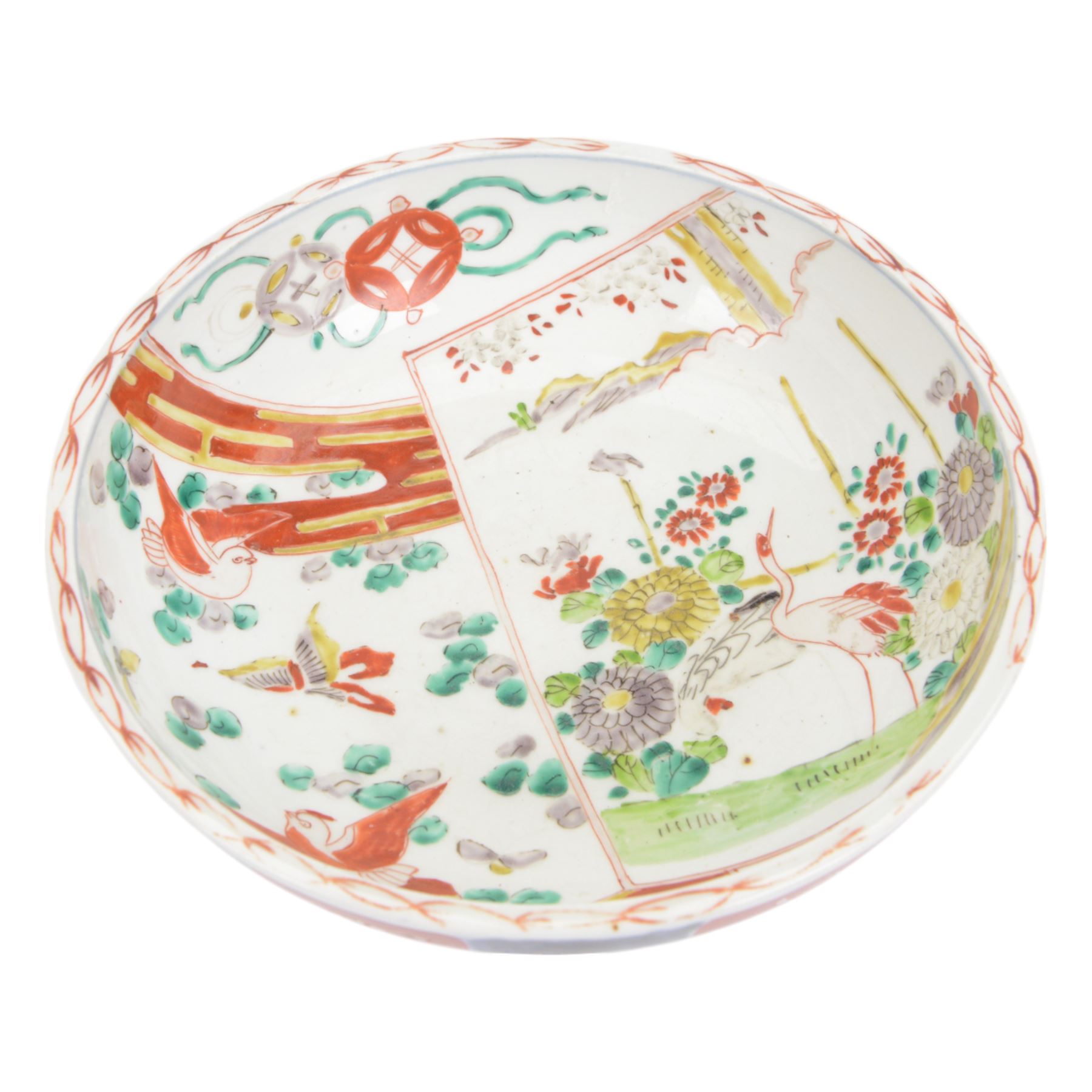 Japaneses imari bowl, decorated to the interior with a crane within a landscape, birds and insects, the external decoration of foliate scrolls, D25cm 