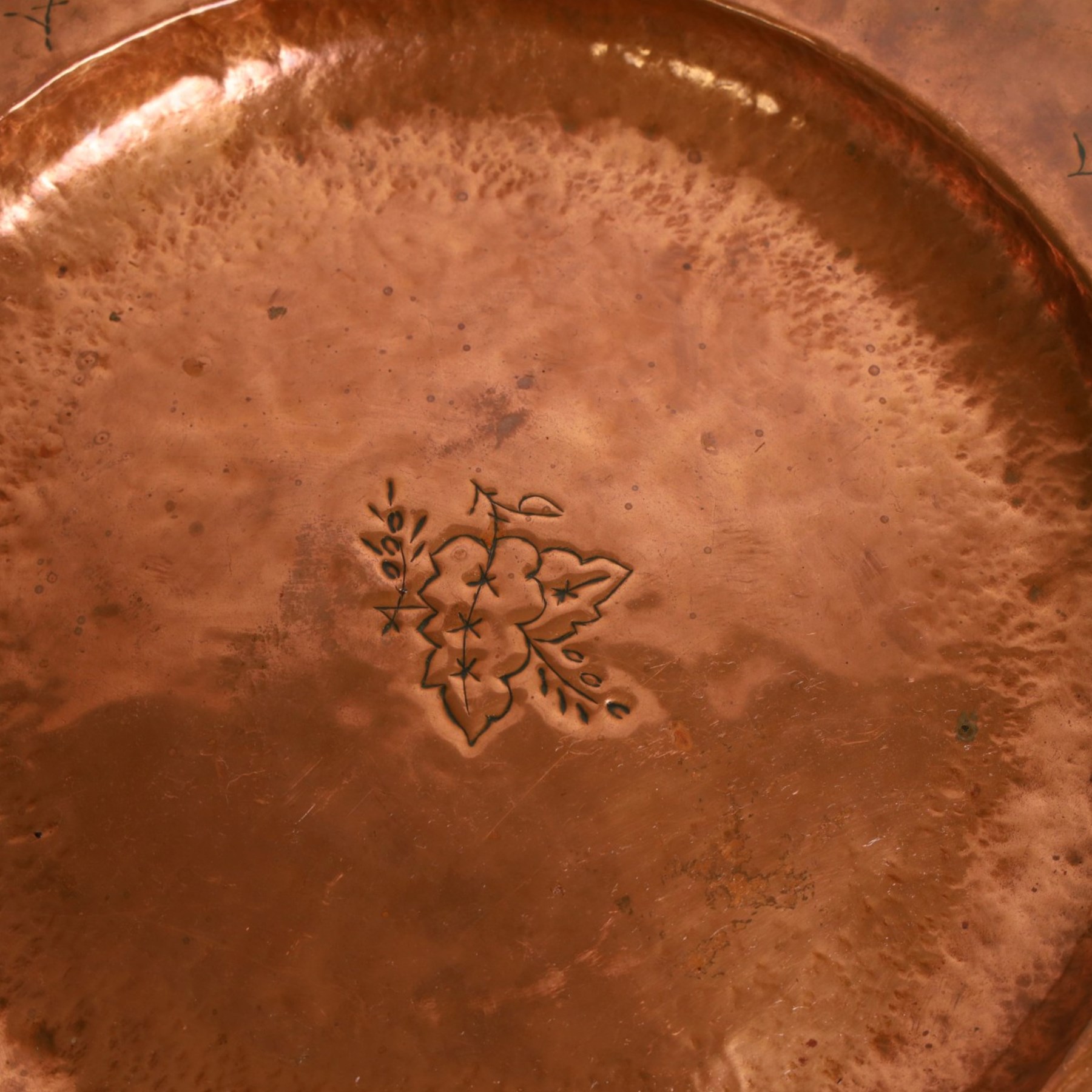 Arts & Crafts Liberty & Co copper charger embossed with stylised leaf design, stamped underneath rim, D44cm