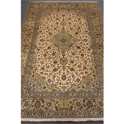  Kashan beige ground rug, central medallion, floral field, repeating border, 300cm x 200cm  