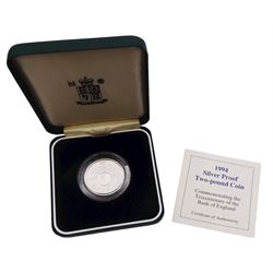 Five The Royal Mint United Kingdom silver proof coins, comprising 1994 two pound commemorating the Tercentenary of the Bank of England, 1996 five pounds commemorating Her Majesty the Queen Elizabeth II 70th birthday, 1997 two pound Britannia, 2000 'Millennium' five pound, all cased with certificate, and 1996 one pound, cased without certificate