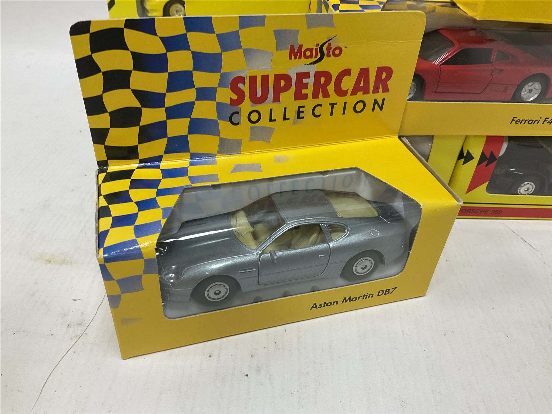 Shell/Maisto - twenty five 1:43 scale die cast cars comprising eighteen Shell and seven Maisto ‘Supercar Collection’ models with further 1:24 scale Maisto McLaren F1 model; all boxed (26) 