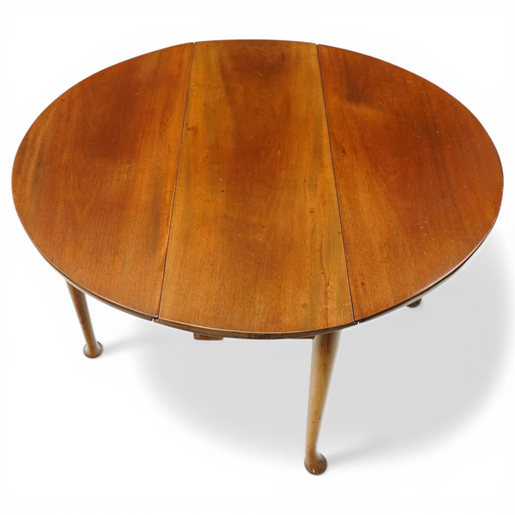 Mid 18th century mahogany pad foot drop leaf table, the circular top with gate leg action, freshly polished throughout