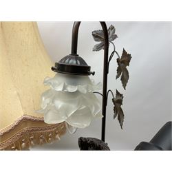 A Belcari figural table lamp, modelled as a young gent leaning upon brick wall, on turned wood base, signed, H70cm incl shade, together with bronzed figural table lamp of a lady with parasol upon ornate circular plinth base, two ceramic table lamps and another lamp (5)