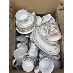 Collection of tea and dinner wares, including an extensive set of 'Christmas Rose' Crown Staffordshire, including tea and coffee wares and two lidded tureens, a blue and white decorated set of cups and saucers, cake stand etc, three boxes . 