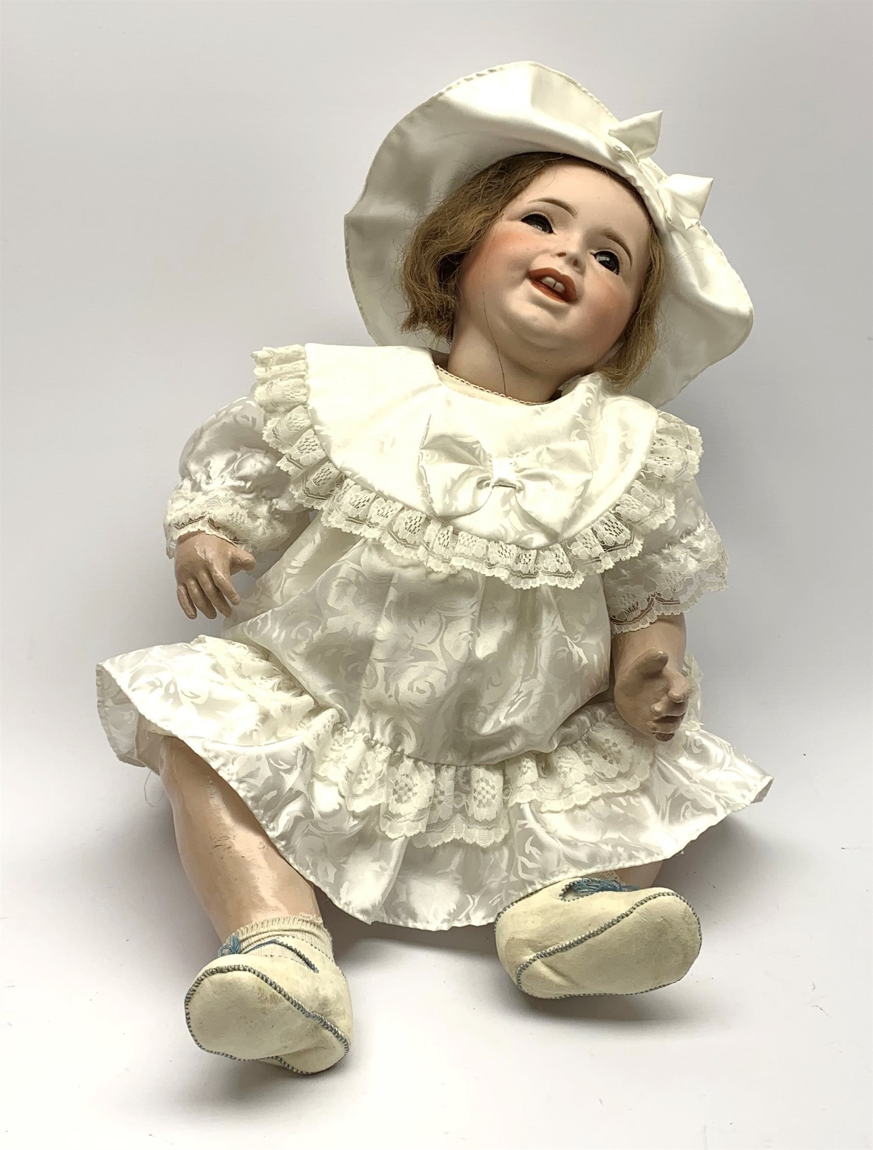 SFBJ 'Laughing Jumeau' bisque head doll with applied hair, sleeping
