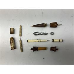 Collection of 19th century and later needle cases, to include a wooden example in the form of an umbrella, a brass champagne bottle 'Moet & Chandon Epernay' etc
