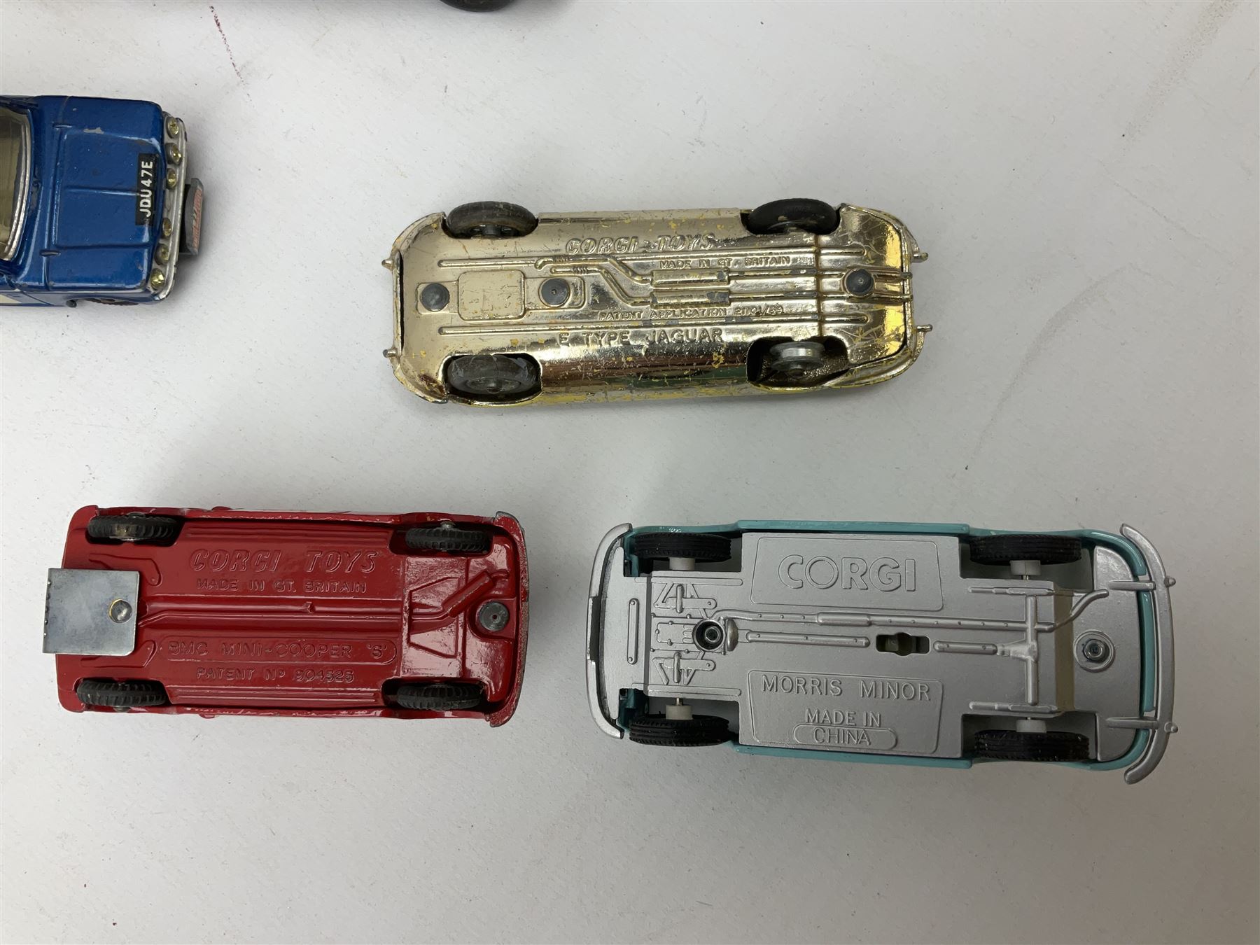 Corgi - thirty unboxed and playworn/repainted die-cast cars including Triumph Herald Coupe, BMC Mini-Cooper 'S', Porsche Carrera, two 'E' Type Jaguars, Rover 2000TC, three Morris Minors, two Aston Martin DB4, two Volvo P1800, MGA, Fiat 2100, Jaguar 2.4 Litre, Jaguar Mark X Saloon etc (30)