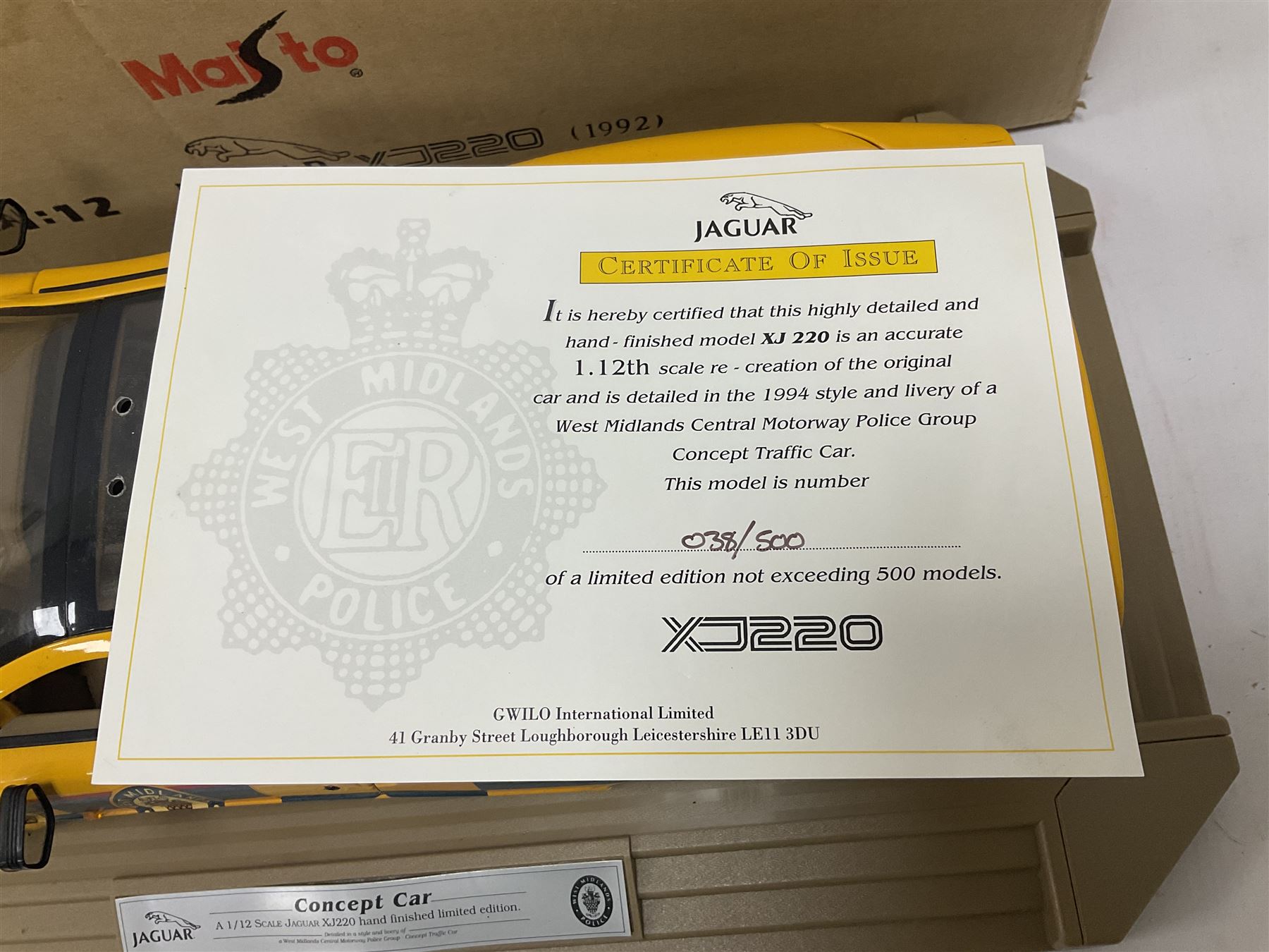 Two Maisto 1:12 scale Jaguar XJ220 scale cars comprising 1992 ‘Concept Car’ West Midlands Police car and 1994 ‘Jag 999’ Thames Valley Police Traffic Car, both on plinths with original boxes and certificates of authenticity 