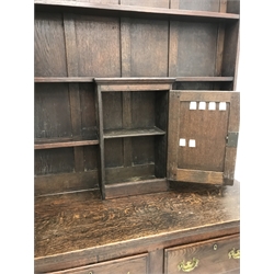 Early 20th century oak dresser, raised three tier plate rack, single cupboard above two drawers, cabriole legs, W122cm, H200cm, D51cm