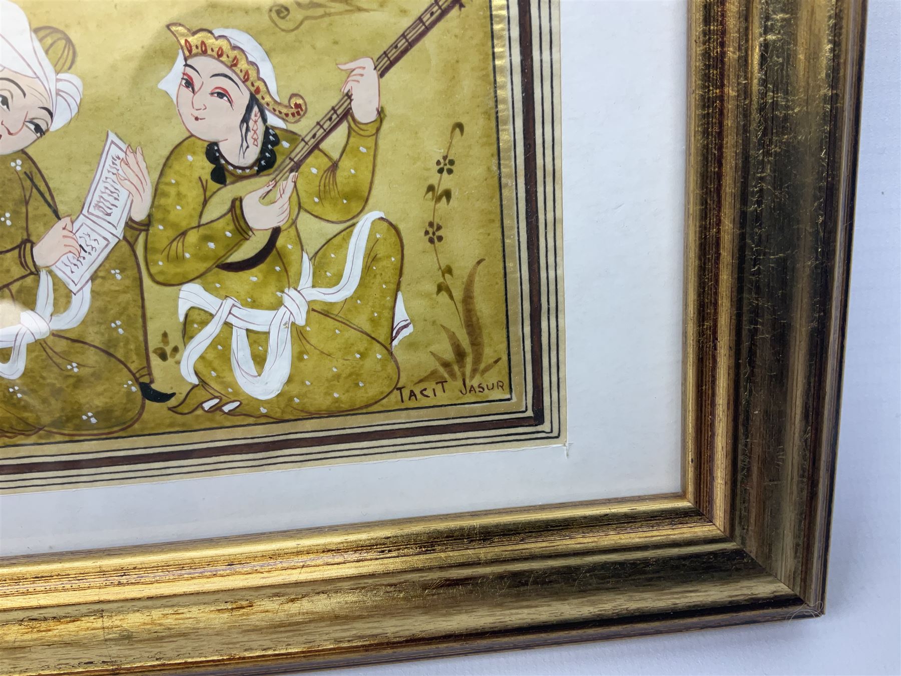 Jasur Orziev (20th century): Couple playing Sitar, miniature gouache signed; African School (20th century): Woman with Bowl on Head, sand on board signed CA together with another sand painting with hands on a globe inscribed Abaraka max 29cm x 23cm (3)