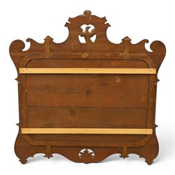 Large George III mahogany wall mirror, parcel gilt shaped frame with scrolling acanthus, shell and foliate decoration, surmounted by carved gilt ho-ho bird, rectangular mirror plate within moulded border, shaped apron with gilt scroll terminals, removed from a Scottish country estate