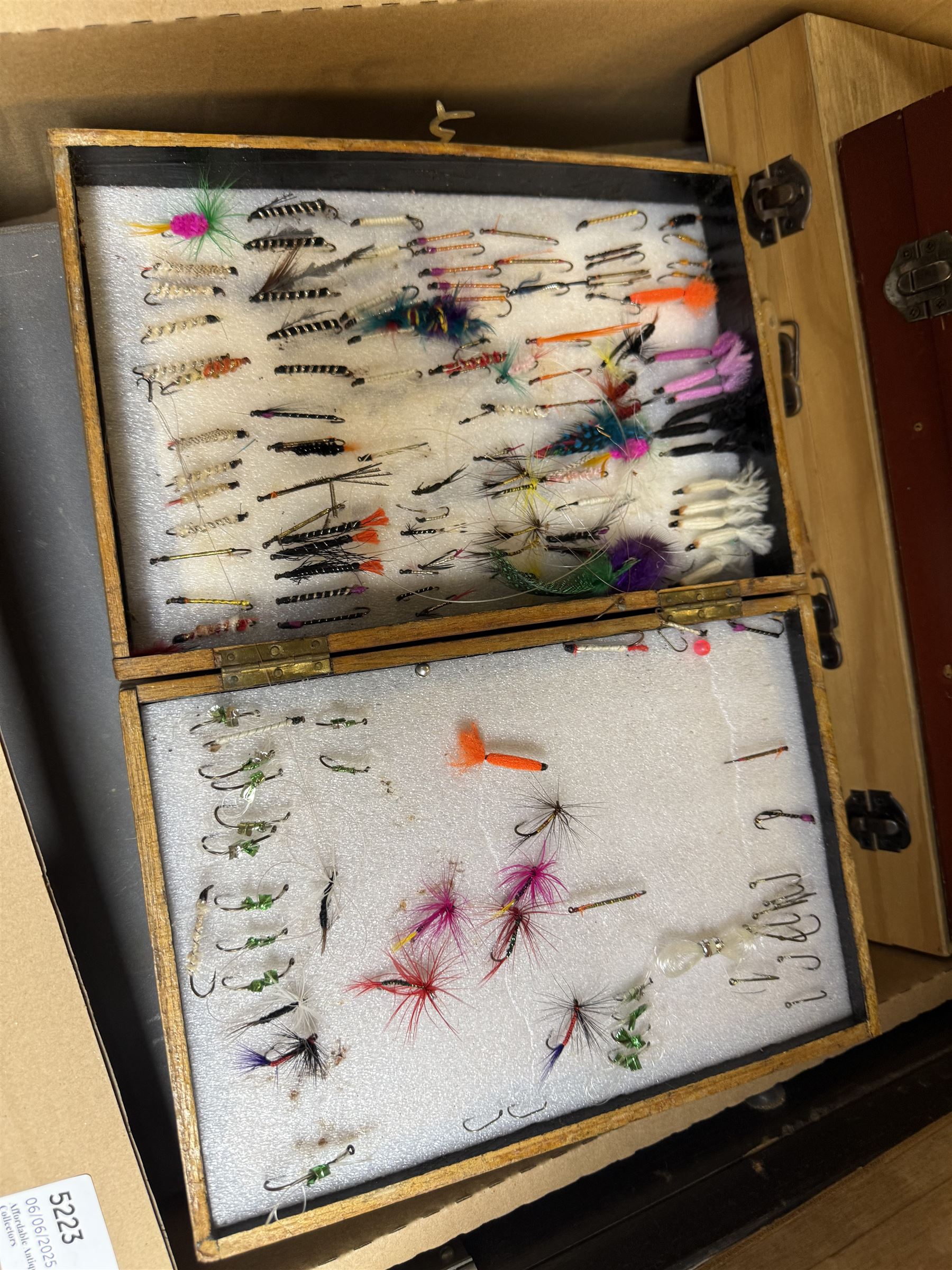 Collection of fishing equipment, including lures, floats and flies 