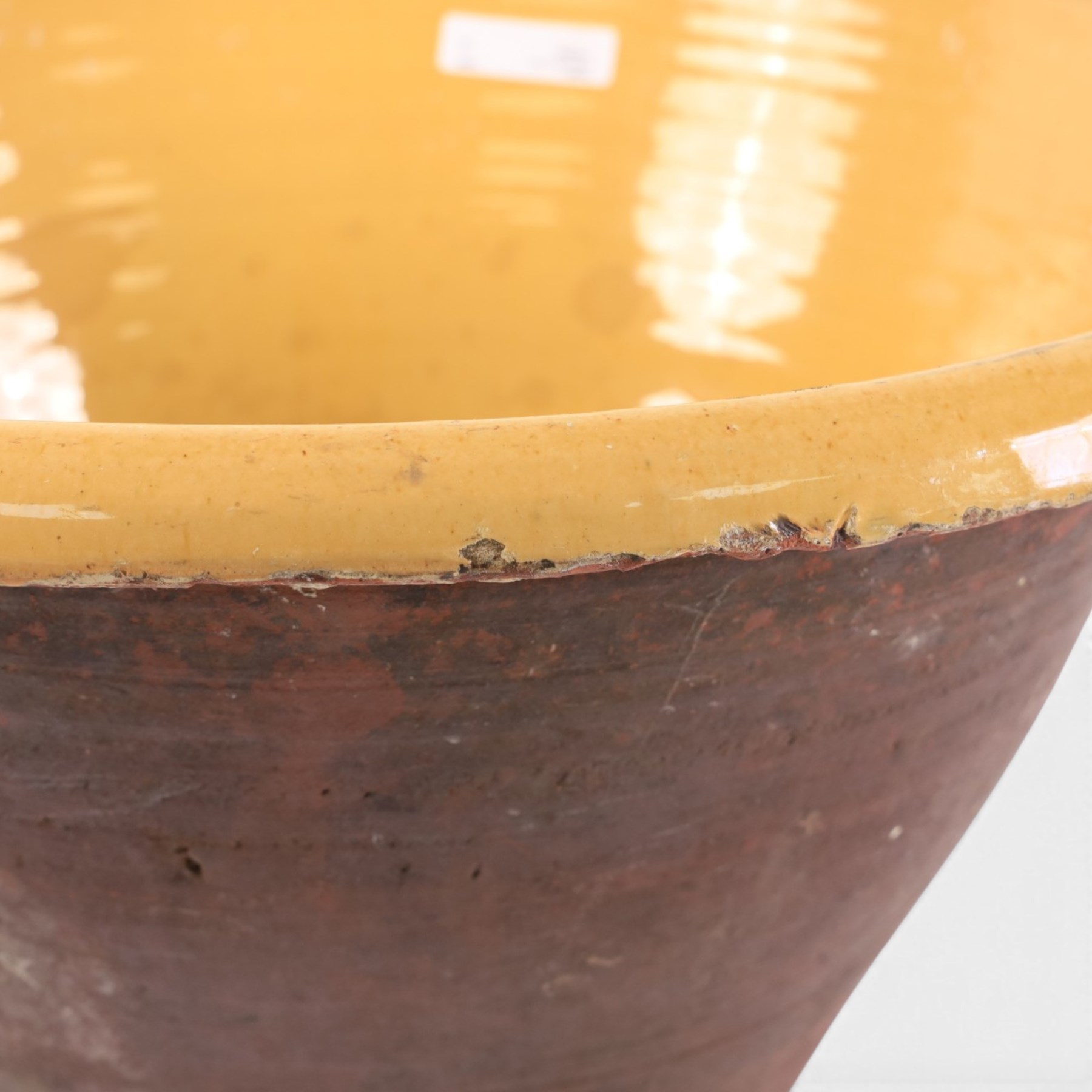 Large pancheon, of tapering circular form, with yellow glazed interior, H28cm, D52cm 