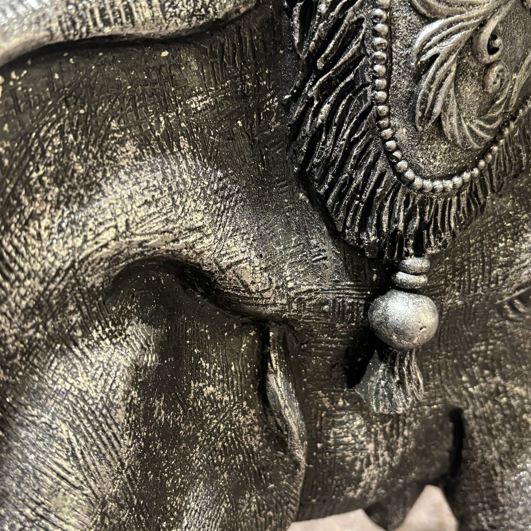 Composite figure of an indian elephant, with a silvered finish, H60cm, L80cm