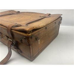 Late 19th/early 20th century stitched and studded leather portmanteau type suitcase with expanding lid and straps, L61cm