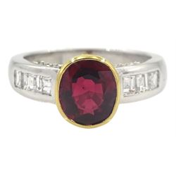 18ct white and yellow gold oval ruby ring, with princess cut diamond shoulders and round brilliant cut diamond gallery, hallmarked, ruby approx 2.20 carat