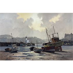 Don Micklethwaite (British 1936-): Boats at Rest in Scarborough Harbour, oil on canvas board signed 40cm x 59cm