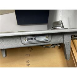 Seamstress sewing machine in case, together with a Singer sewing book