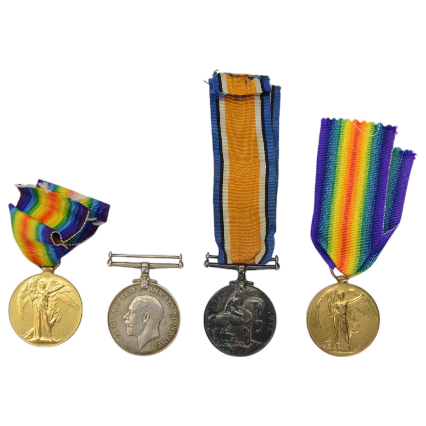 WWI two pairs of medals together with The Soldiers Small Book of Thomas Adams, Kings Message to the RAF, and other military ephemera and a soldiers helmet  