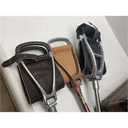 Three shooting sticks, together with four vintage leather brown suitcases of various sizes, largest suitcase H40cm L65cm 