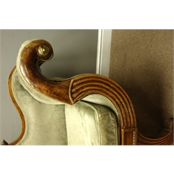  Regency beech framed double scroll end sofa, shaped back with bead and flute carved frieze and legs, loose squab seat & arm cushions, W220cm, H84cm  