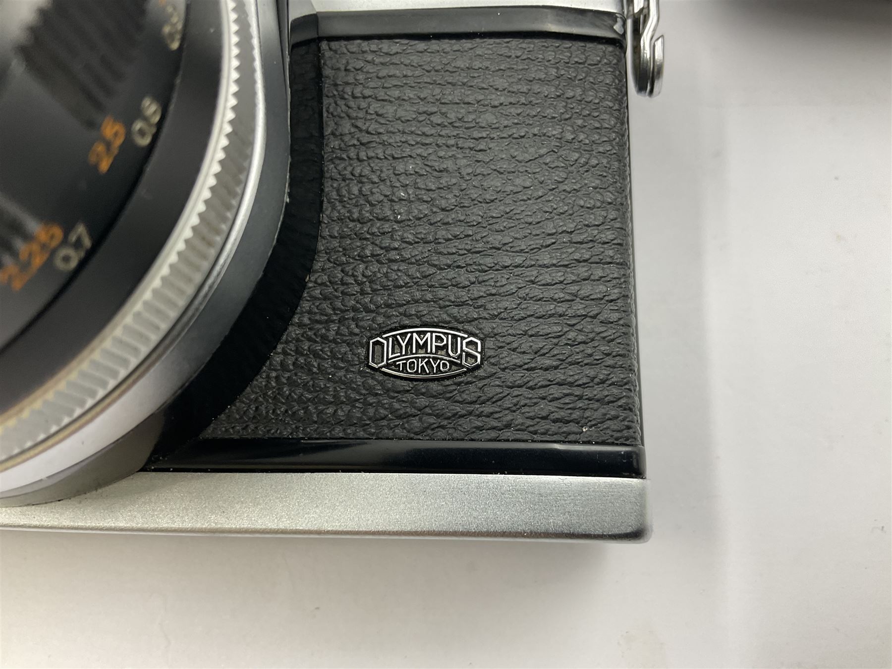 Olympus FTL camera body, serial no. 109019, with 'Olympus F.Zuiko Auto-S 1:1.8 f=50mm' lens serial no. 101434, in leather case 