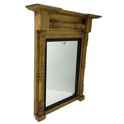 Regency gilt framed pier mirror, projecting cornice over half turned column pilasters decorated with gesso leaves, moulded and ebonised inner slip framing plain mirror plate