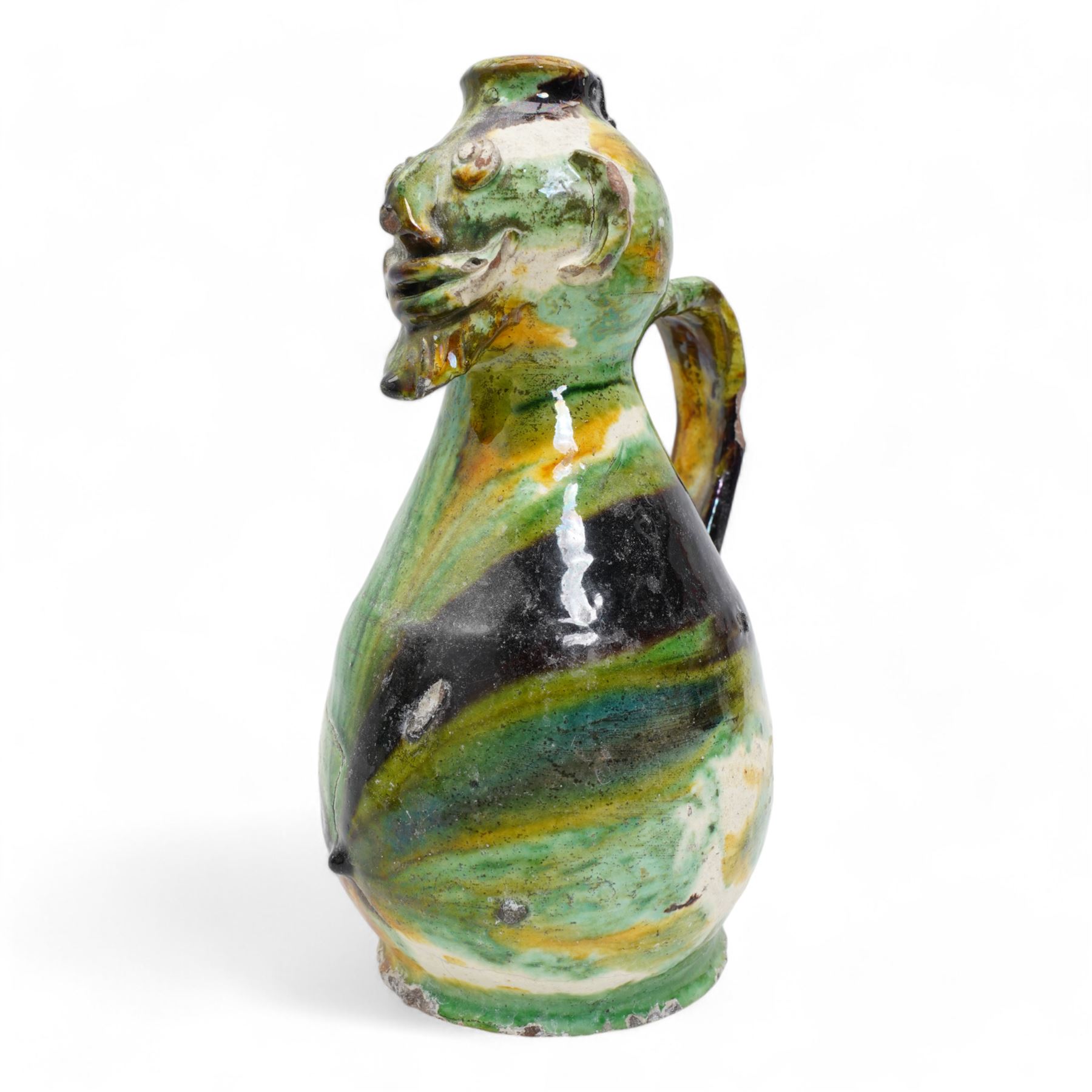 Two early 20th century Italian glazed terracotta wine flasks, one of twin handled form, applied with shells and insects, the other formed as a male figure, H24cm (2)