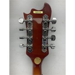 Eastern eight-string mandolin with sunburst finish and mother-of-pearl inlay L68.5cm; and another Harmony mandolin with cracked headstock (2)