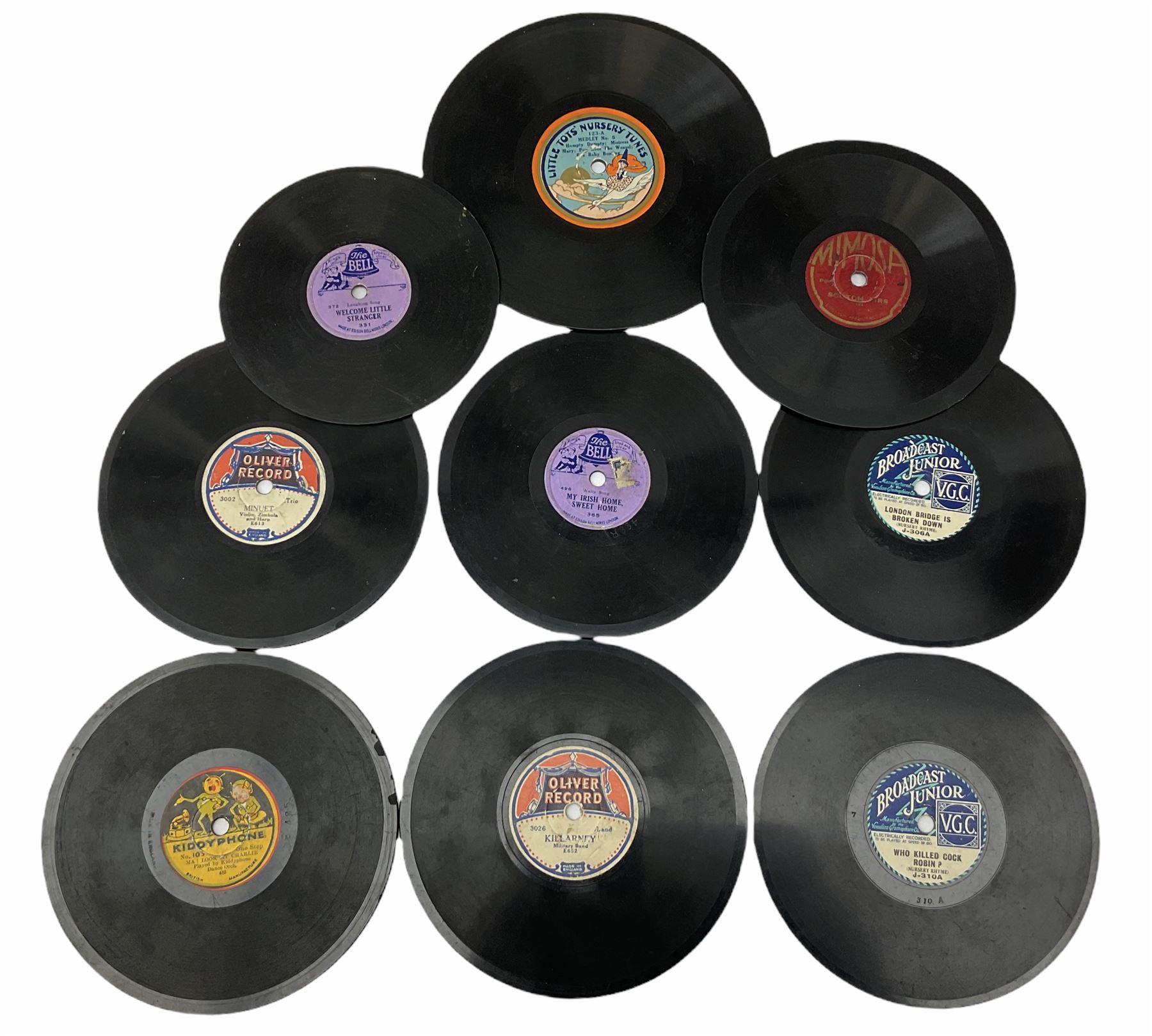 Gebruder Bing Germany Pigmyphone child's portable toy gramophone in woodgrain finish tin-plate box with key and tin of needles L15cm; and nine small records of nursery rhymes; together with a Japanese tin-pate 'Skip Rope Animals' clockwork toy, boxed.