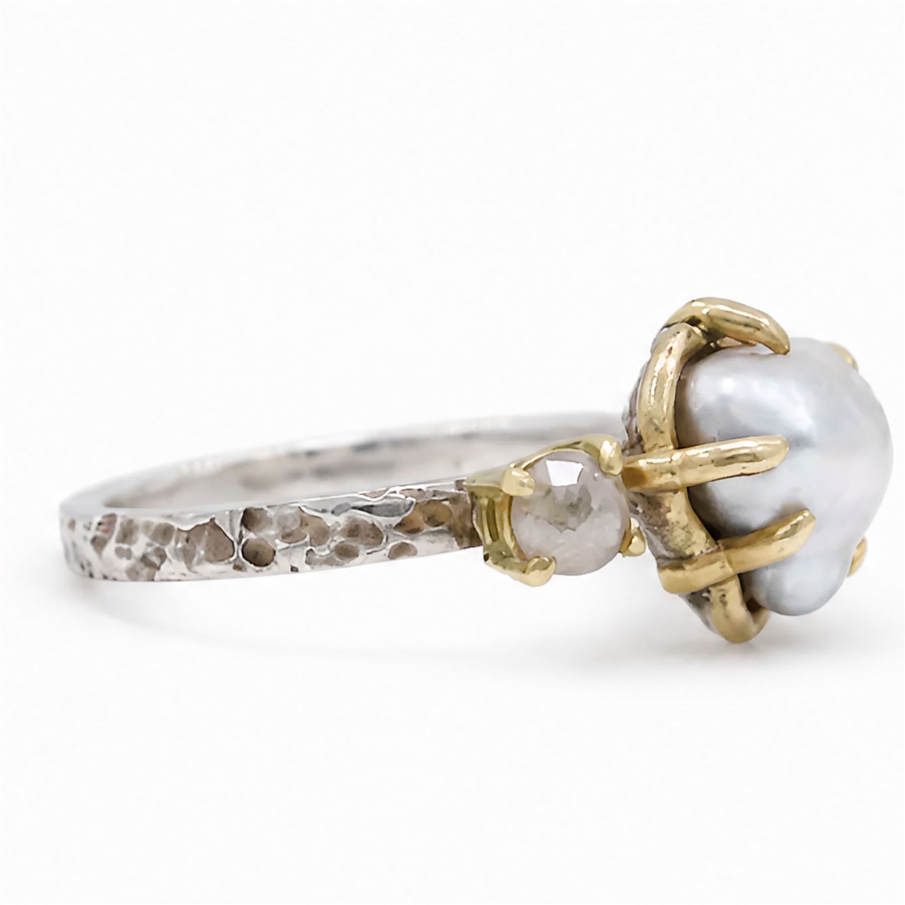 Silver and 9ct gold pearl and diamond ring by Susi Hines, single Keshi pearl set with a single round brilliant cut diamond and two rose cut diamonds, to a bark textured shank, London 2020