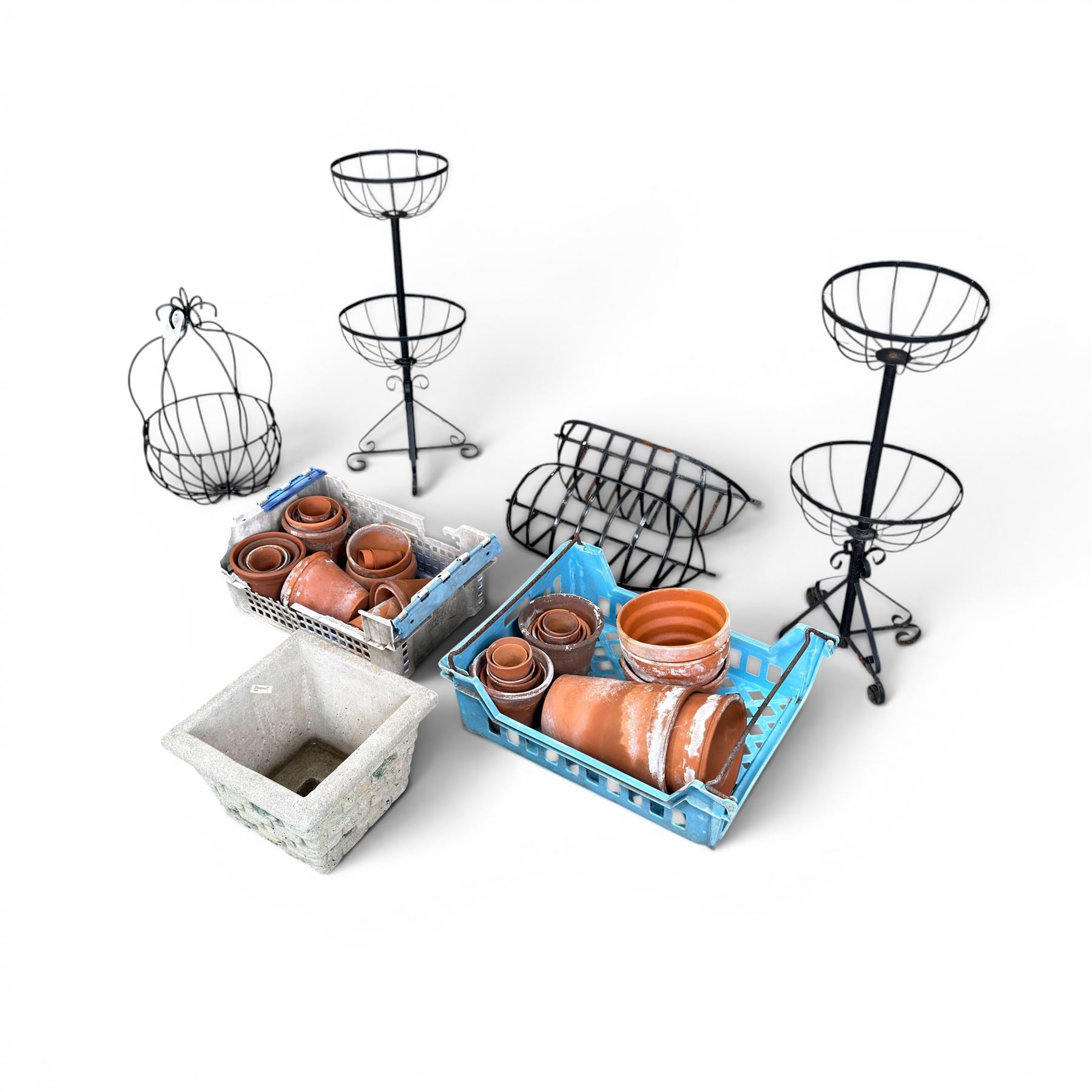 Pair of two tiered flower baskets, two hay racks, hanging basket, two boxes of plant pots and a square stone planter