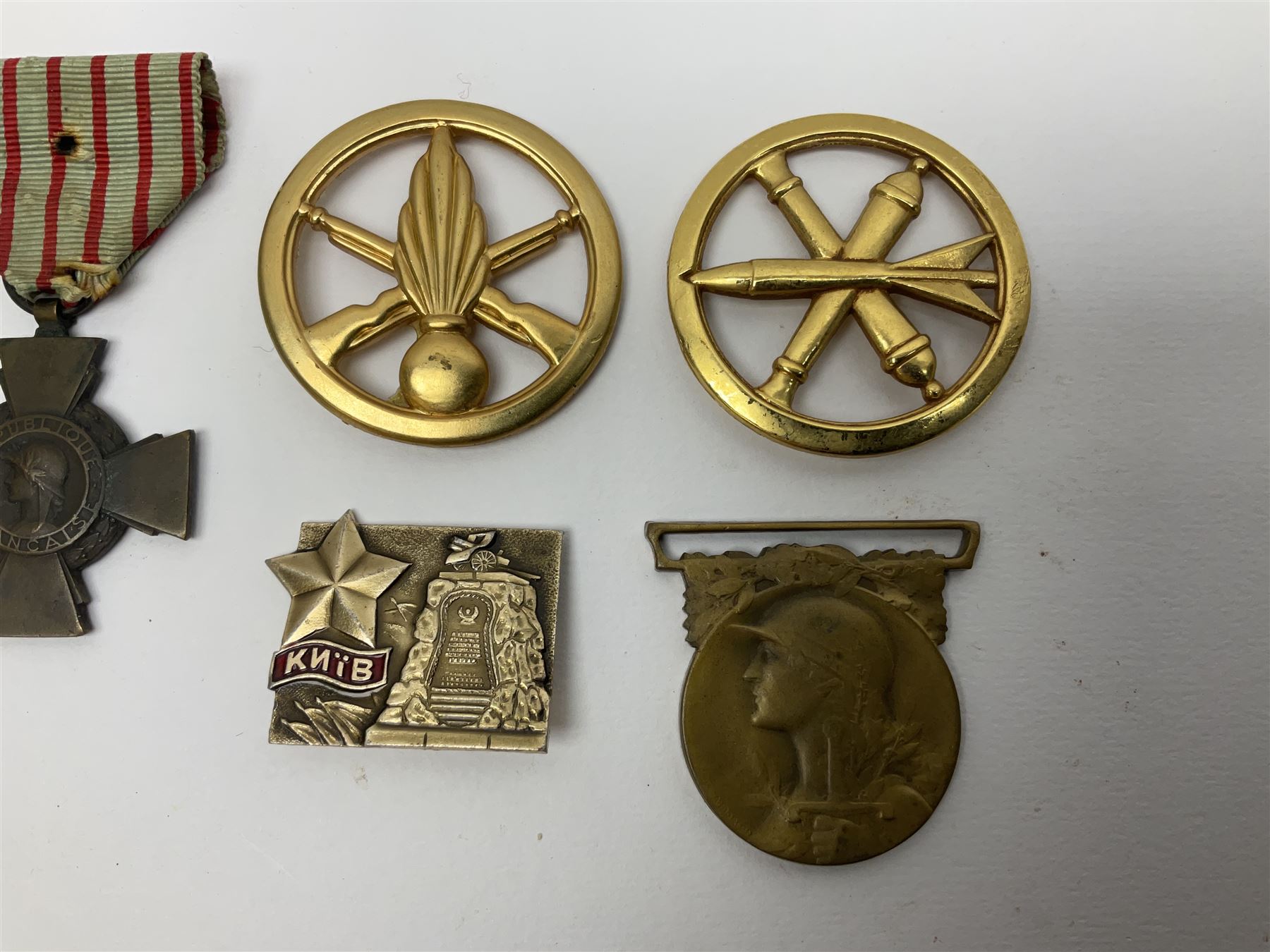 Five WW1 French medals comprising Medaille Militaire Gallantry Award, two Croix de Combattant, Medaille Commemorative Francais 1914-18 and a Patriotic Medal; together with small quantity of Russian badges etc