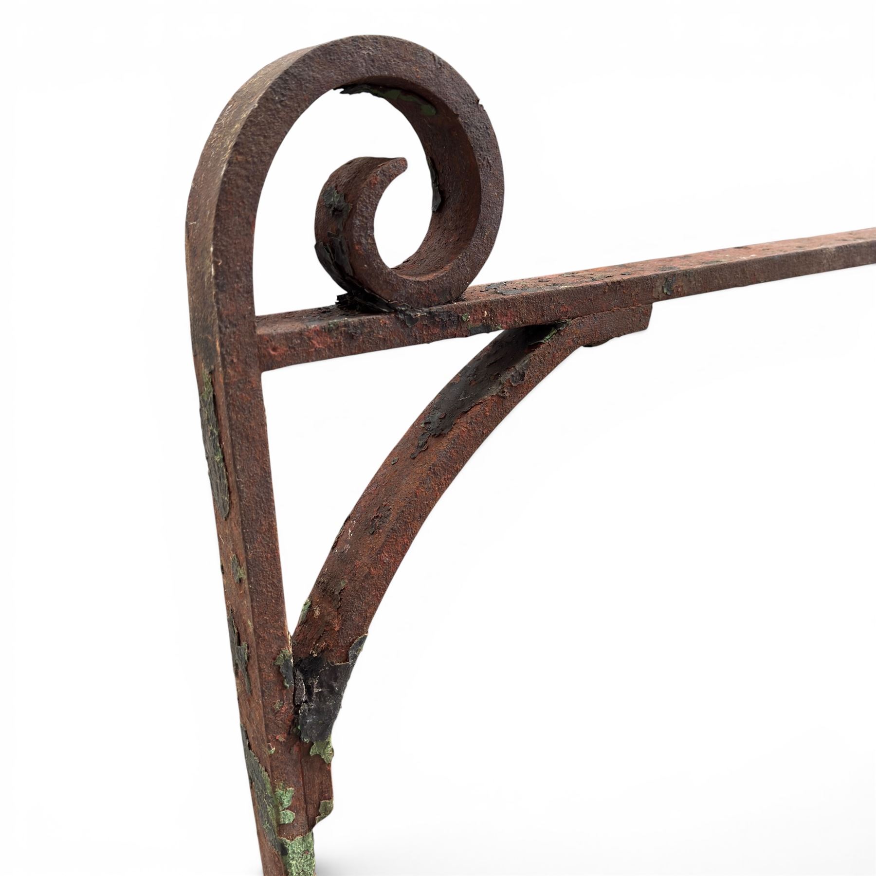 Georgian wrought iron single garden gate, pointed finial over strapwork cresting rail and arched profile with spearhead finials, the opposing side with scrollwork and hinged latch