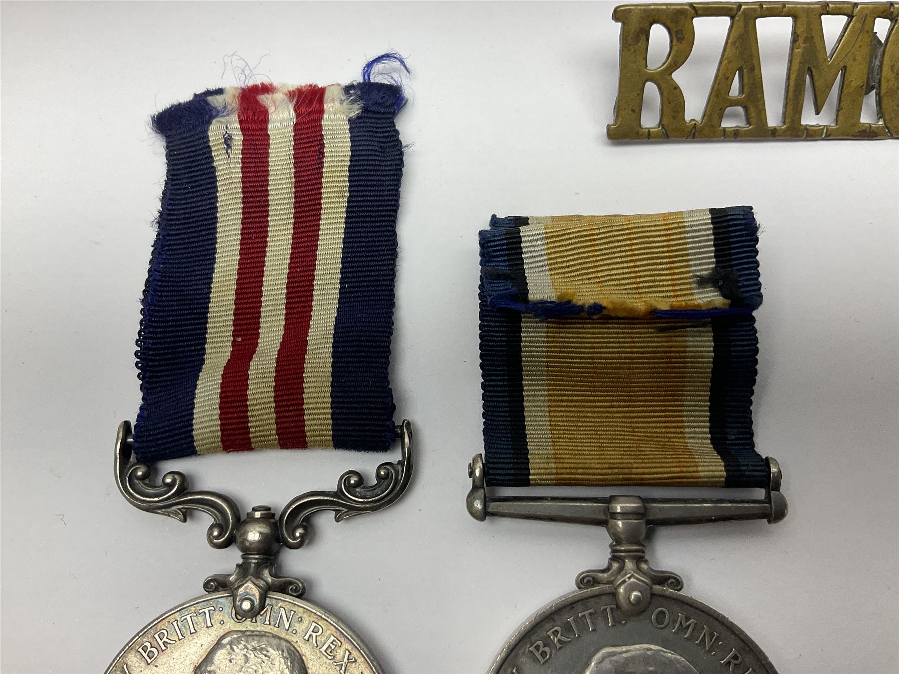 WWI RAMC Military Medal group of four comprising MM awarded to 439278 Pte. R.W. Sainsbury 1/3 S.M.F.A. R.A.M.C. T.F., British War Medal, Victory Medal and 1914-15 Star awarded to 2160 Pte. R.W. Sainsbury R.A.M.C.; all with ribbons; together with RAMC shoulder title

