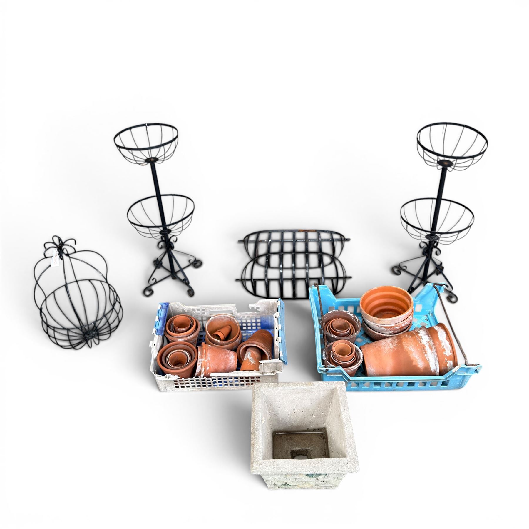 Pair of two tiered flower baskets, two hay racks, hanging basket, two boxes of plant pots and a square stone planter
