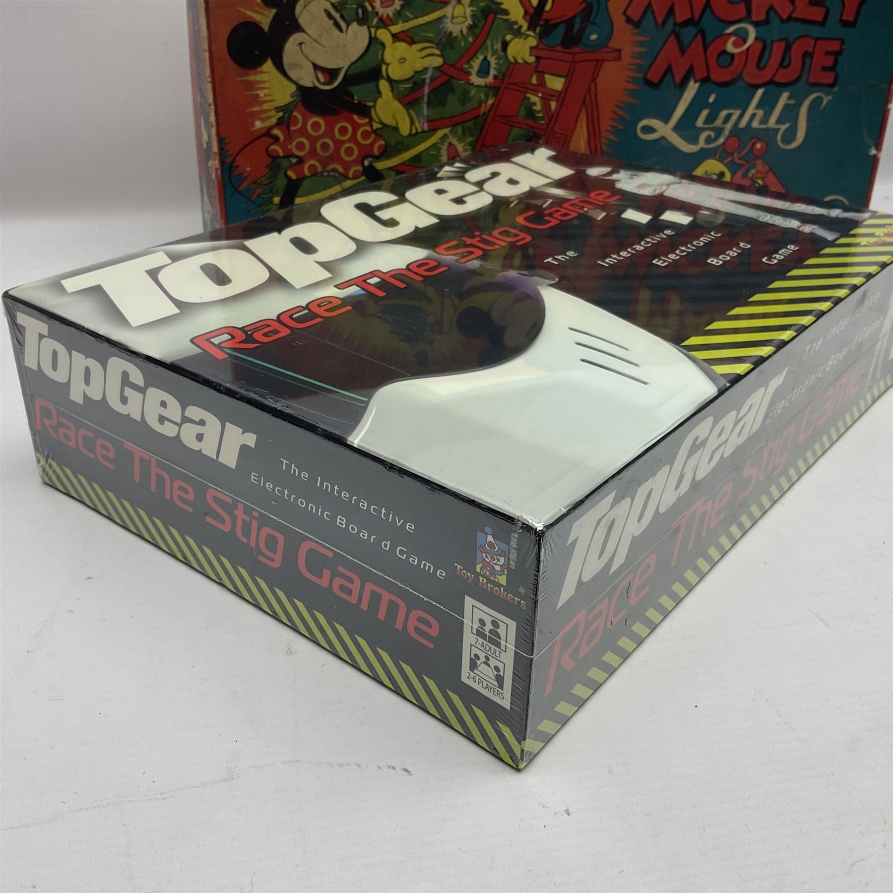 Mazda Mickey Mouse Lights by The British Thomson-Houston Co. Ltd.; boxed; unopened Top Gear Race The Stig game; Dr. Who Talking Cyberman; and Dr. Who Talking Dalek; both boxed (4)