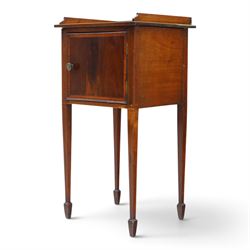 Edwardian mahogany pot cupboard, with three quarter galleried top, single cupboard door, raised on square tapering supports terminating in spade feet