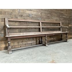 Victorian pitch pine bench pew, turned arms and legs, rail back with plank seat, 249cm