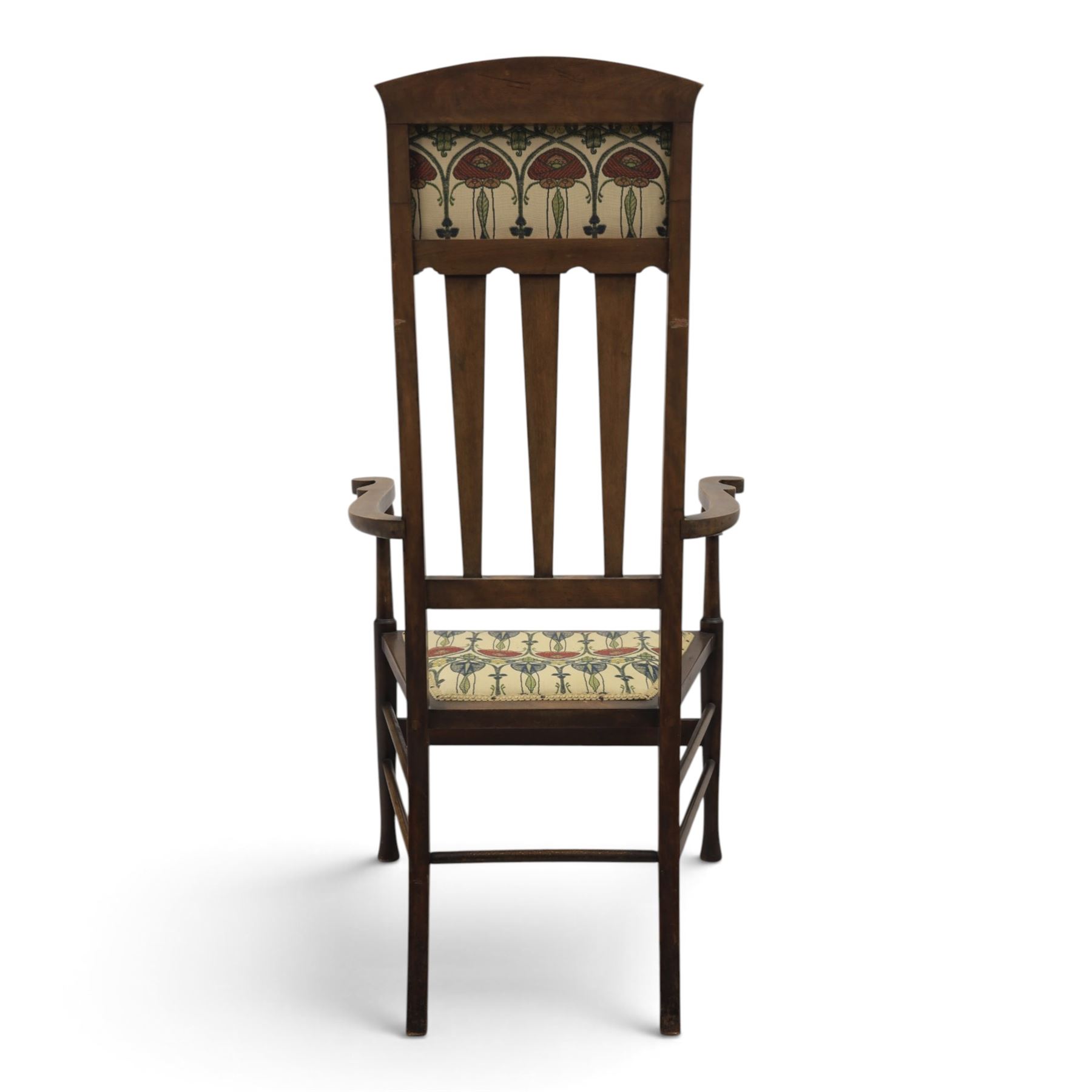Robson & Sons, Newcastle on Tyne - Arts & Crafts high back armchair, upholstered in Mackintosh style fabric, shaped armrests and cylindrical supports united by stretchers