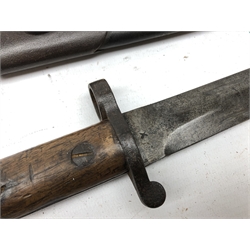  WW1 British Lee Metford or Enfield rifle bayonet 30.5cm twin edge blade stamped crowned ER, 1903, 11 '06 crown over S46, broad arrow WD, crown over 35 W X, twin screwed wooden grip, steel pommel stamped 517 3 M I 217, L42.5cm, in matching leather scabbard stamped 217  