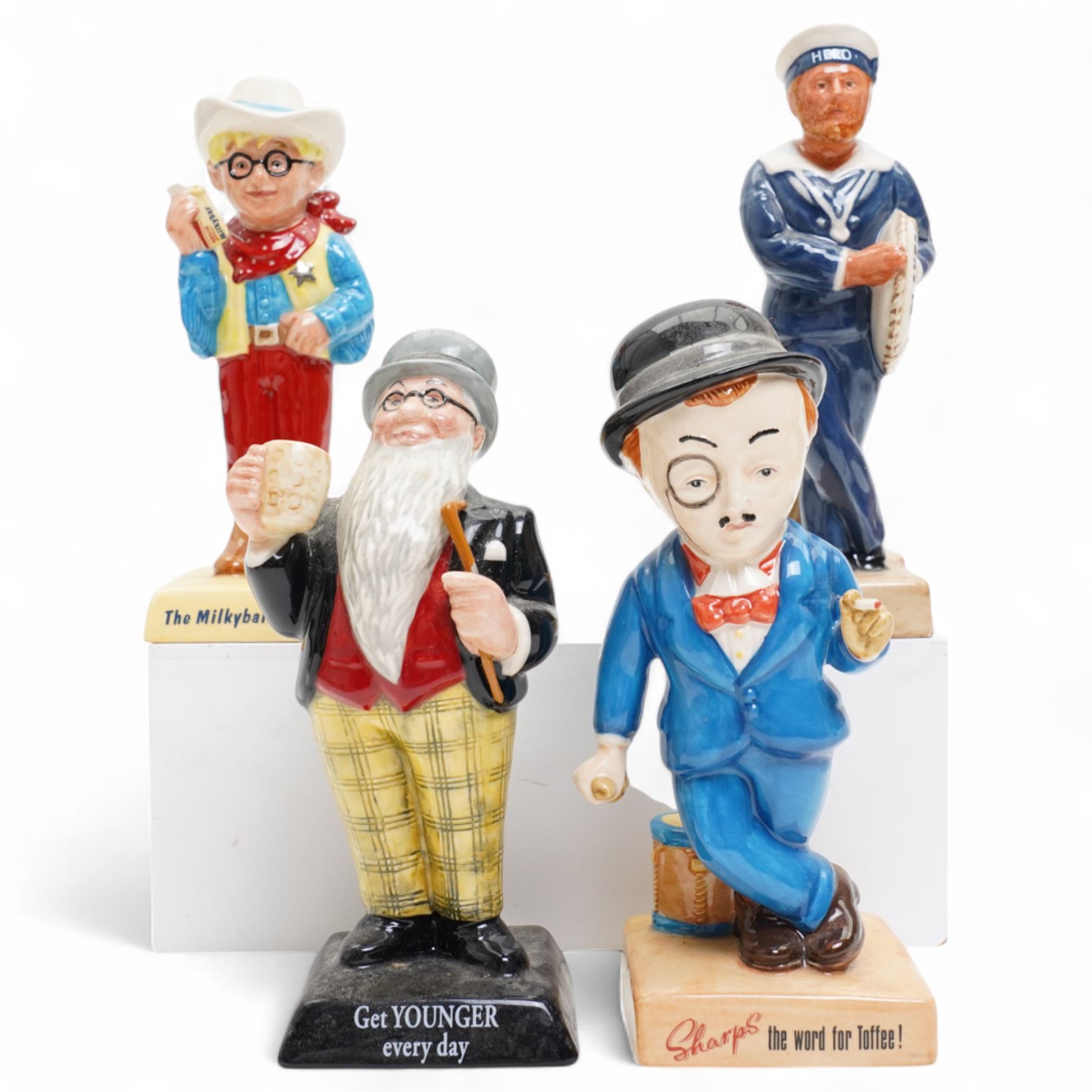 Four Royal Doulton 20th Century Advertising Classics figures, comprising Players Hero AC5, Father William AC2, The Milkybar Kid Ac7 and Sir Kreemy Knut Ac3