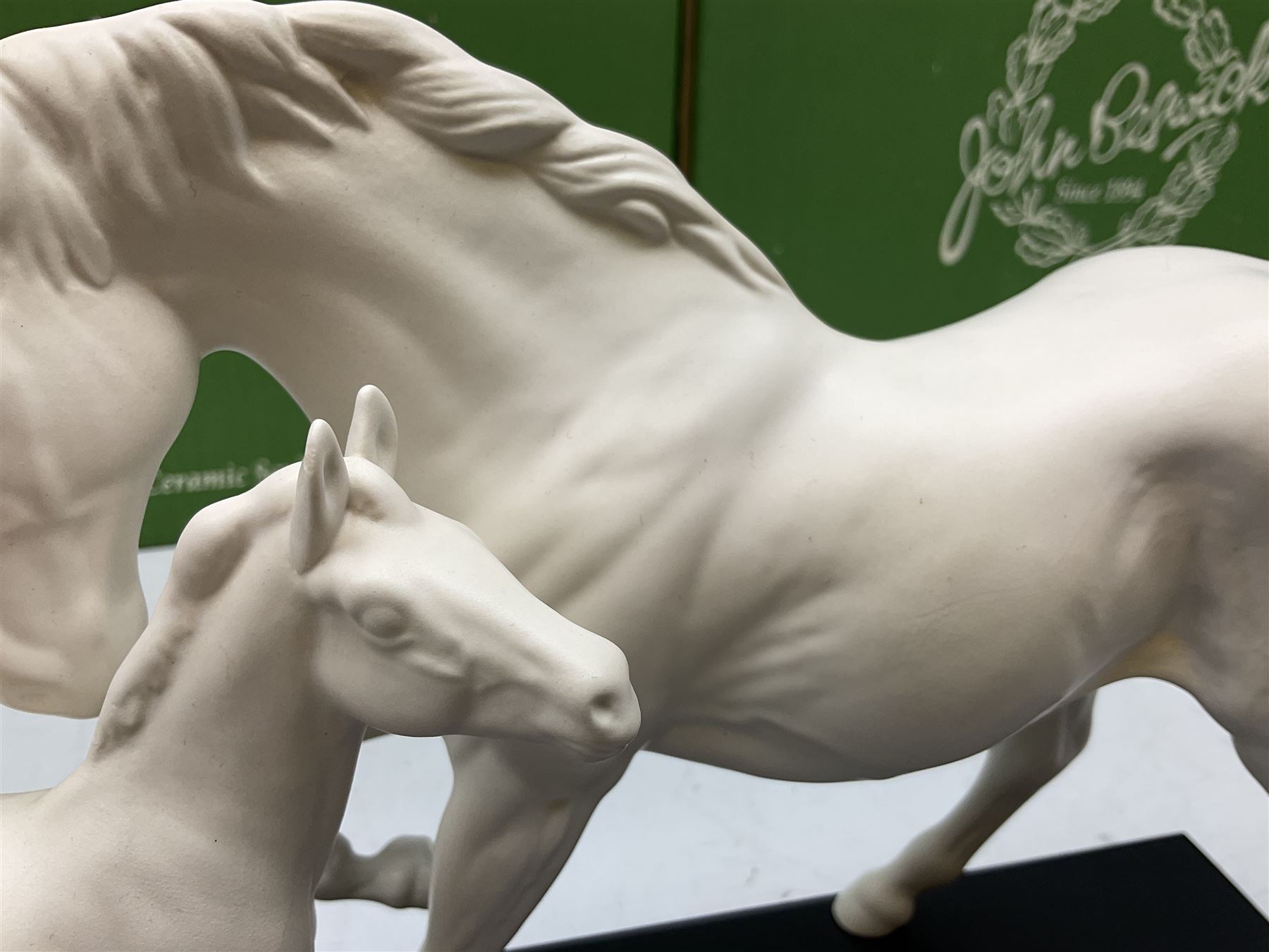 Five Beswick and Royal Doulton horse figures in matt white on black plinths, comprising of  Spirit of Affection no. 2689/2536, Springtime no.2837, Spirit of peace no.2916, Spirit of earth no.2914 and Spirit of the wild no. 183, together with a composite figure of a horse (6)