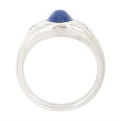 Platinum sapphire and diamond three stone ring, single cabochon sapphire of 1.65 carat, with a rubover set old cut diamond set either side, stamped 850 Plat, total diamond weight 0.42 carat